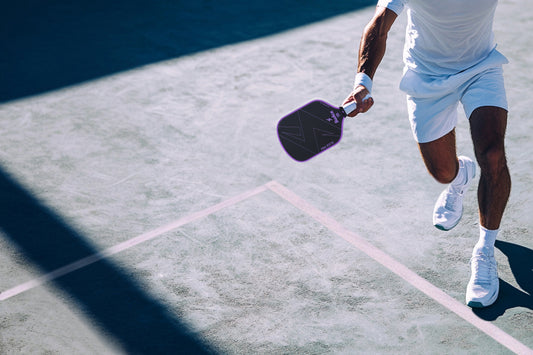 a-man-playing-pickleball-on-the-court